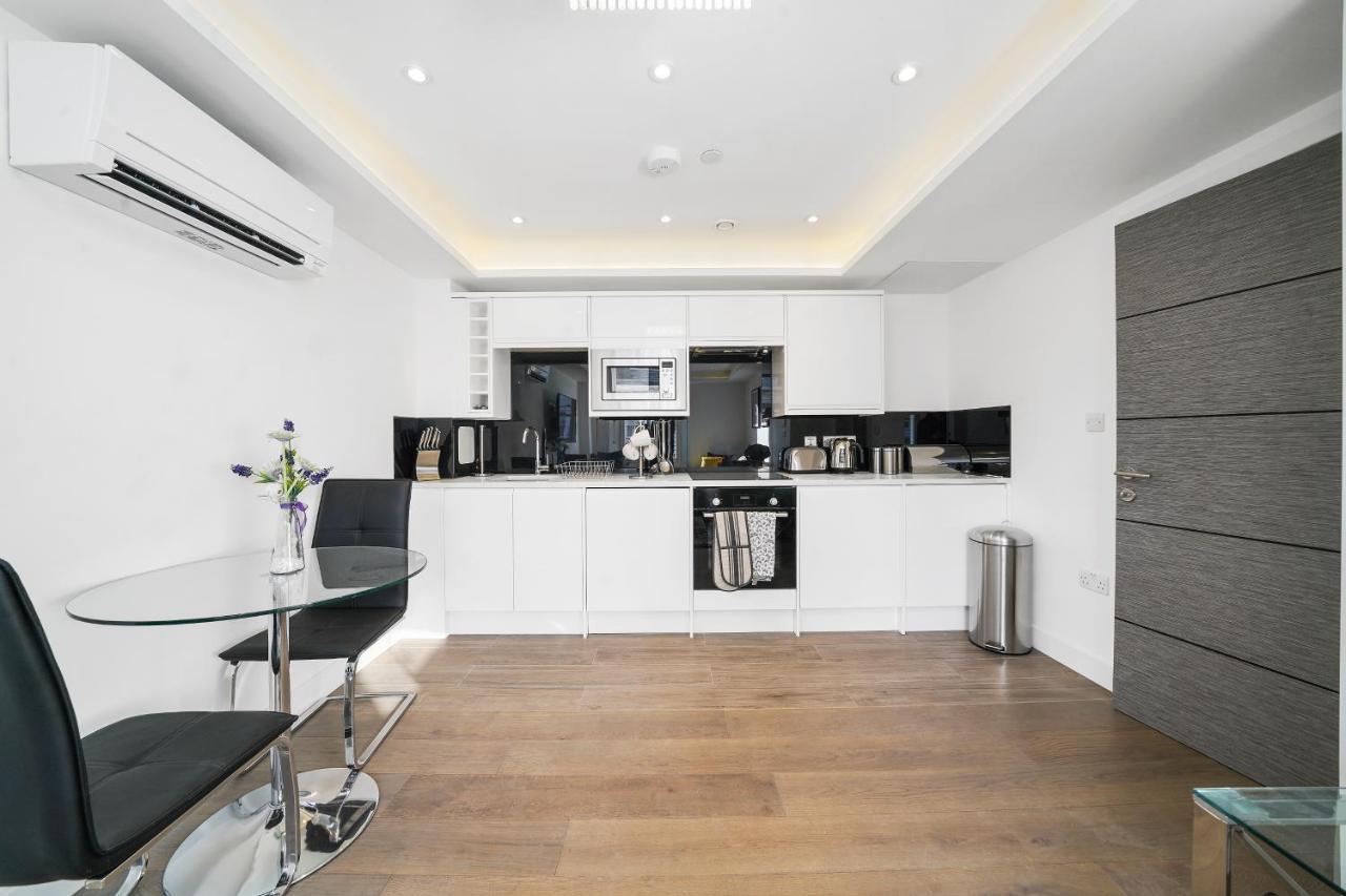 City Prime Apartments Londra Dış mekan fotoğraf A kitchen in a serviced apartment in London